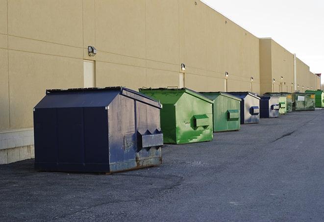 large roll-off dumpsters prepared for construction waste in Auberry CA